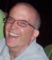 Headshot of Roger Millsap smiling
