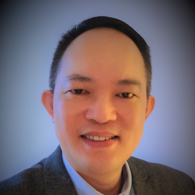 Headshot of Jimmy de la Torre